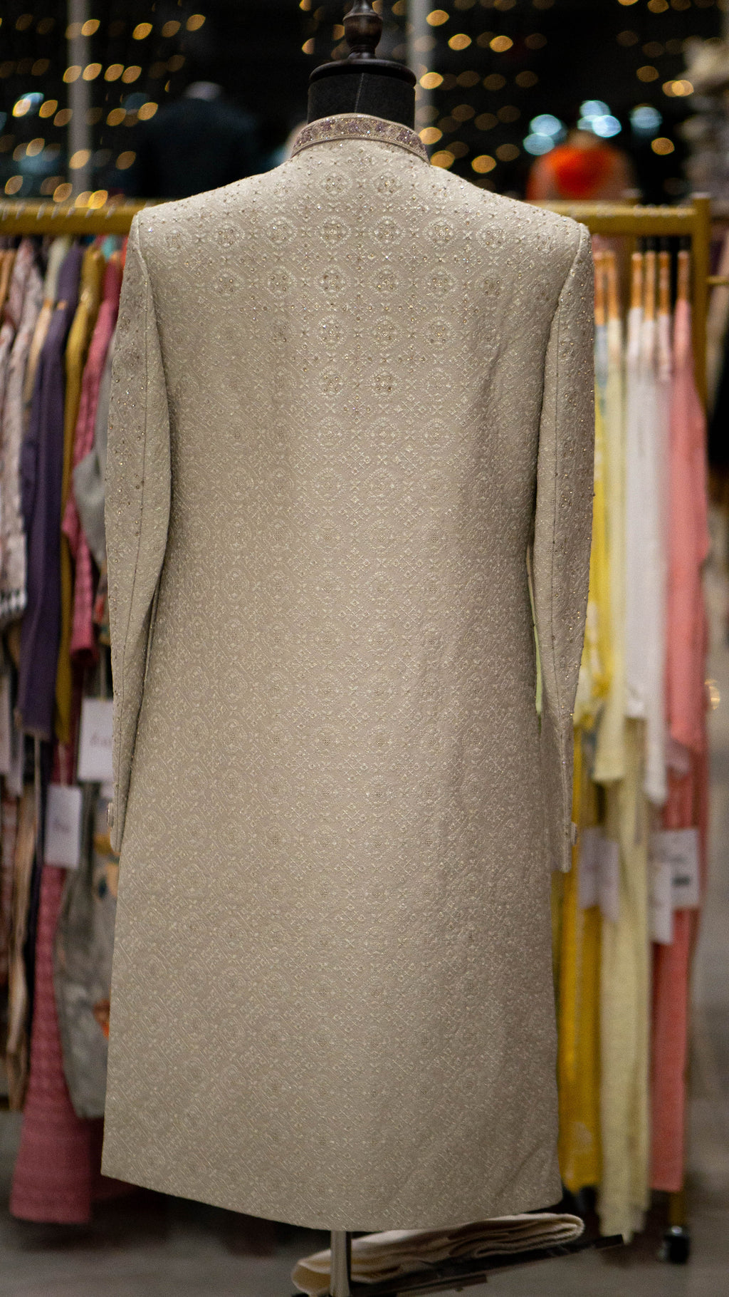Beige mannequin in a clothing store setting