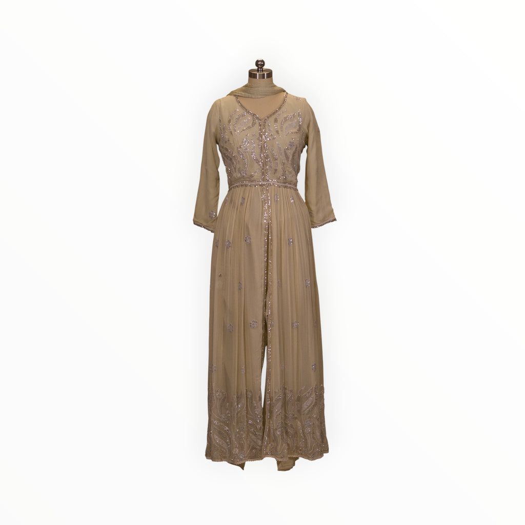 Zari Designs beige Anarkali dress with intricate silver embroidery and a front slit on a mannequin