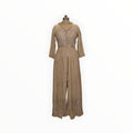 Zari Designs beige Anarkali dress with intricate silver embroidery and a front slit on a mannequin
