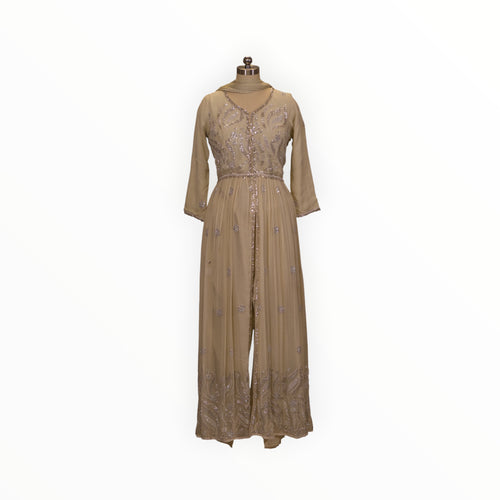 Zari Designs beige Anarkali dress with intricate silver embroidery and a front slit on a mannequin