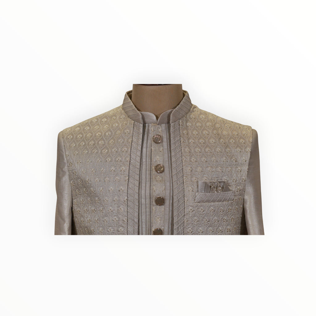 Zari Designs traditional Indo-Western men's beige sherwani with intricate floral embroidery and metallic buttons