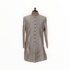 Zari Designs men's beige Indo-Western sherwani featuring vertical pleats and a button-down front on a mannequin