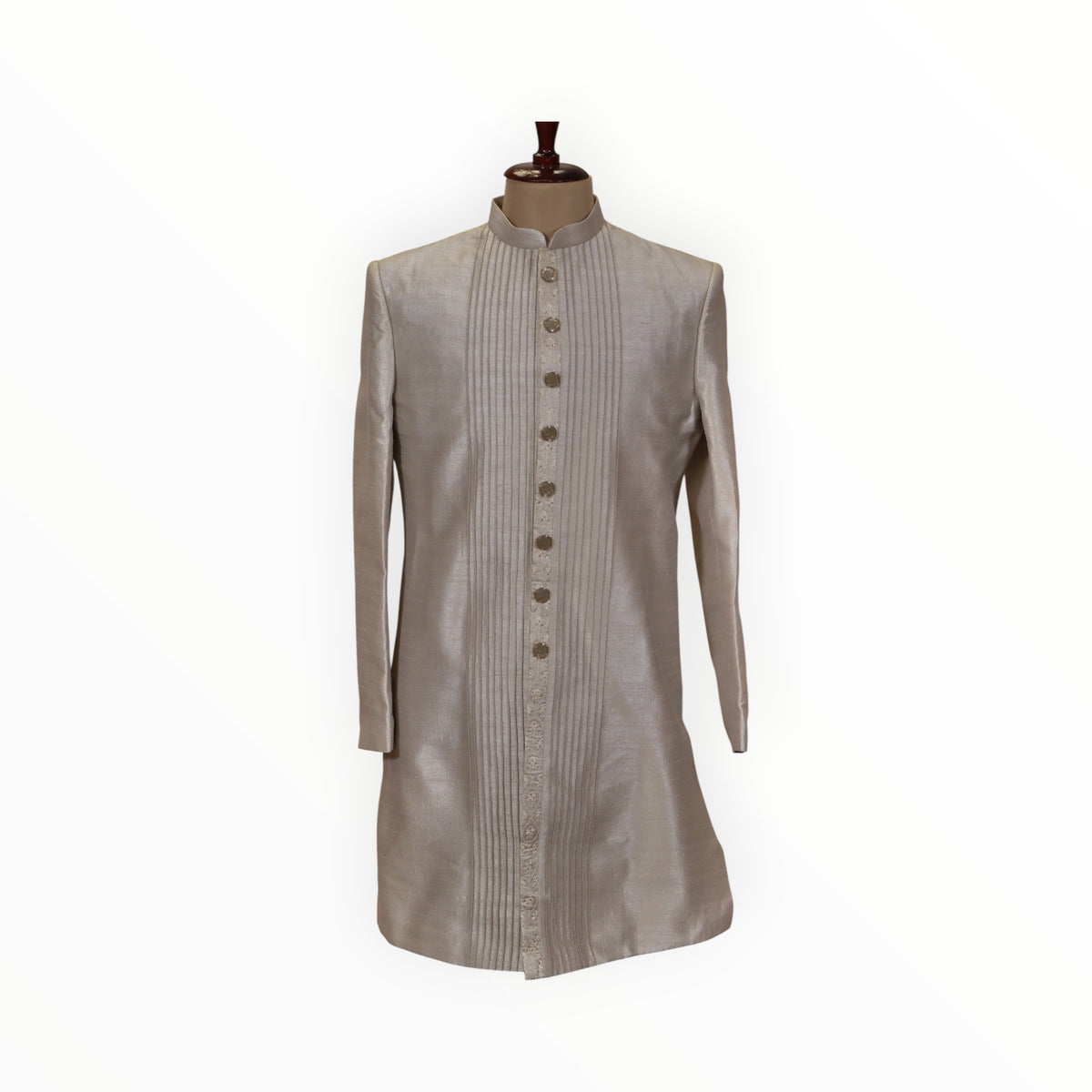 Zari Designs men's beige Indo-Western sherwani featuring vertical pleats and a button-down front on a mannequin