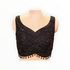 Zari Designs black sleeveless blouse featuring intricate beadwork and floral embroidery on a mannequin