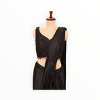 Zari Designs black ready-to-wear saree featuring a sleeveless blouse with intricate beadwork and sequin embroidery.