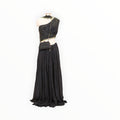 Zari Designs black drape saree with an embellished one-shoulder blouse and matching beaded clutch on a mannequin