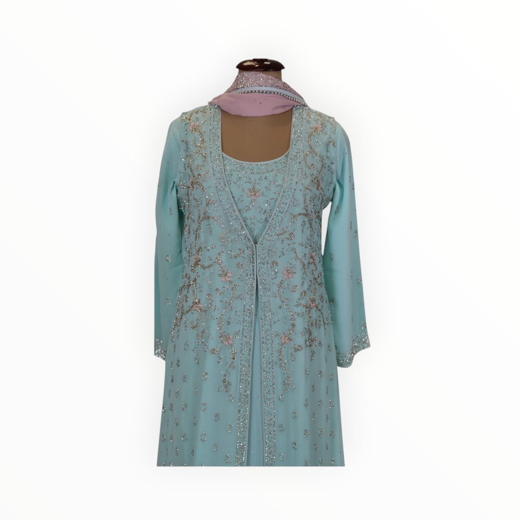 Zari Designs traditional light blue georgette gown with intricate silver embroidery and a matching pink dupatta.