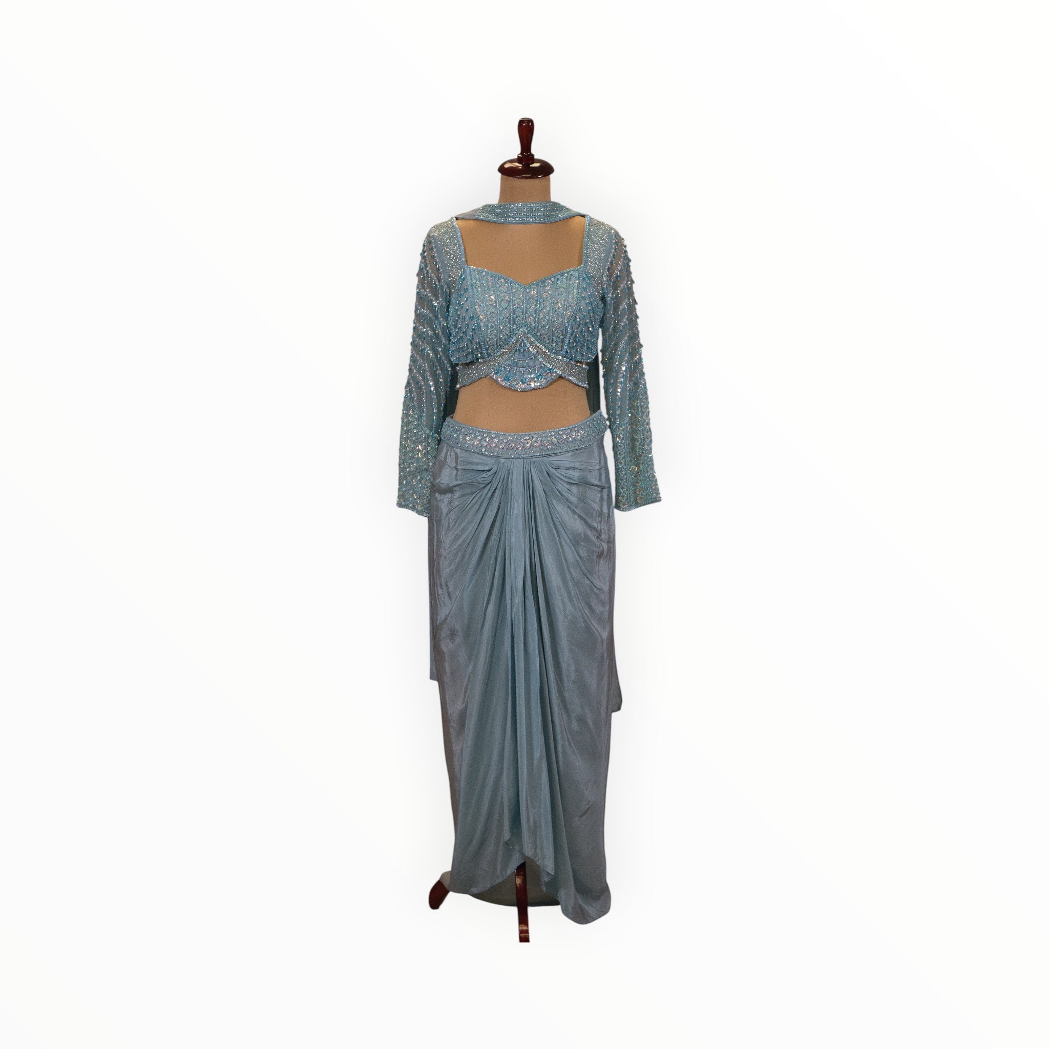 Zari Designs light blue Indo Western set featuring a sequin-embellished crop top and a draped dhoti-style skirt.