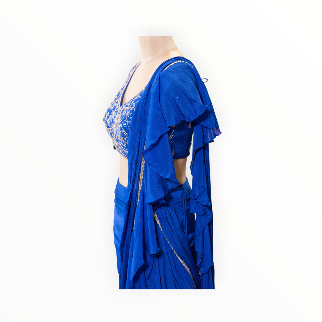 Zari Designs royal blue ready-to-wear saree with ruffled sleeves and intricate silver embroidery on the blouse