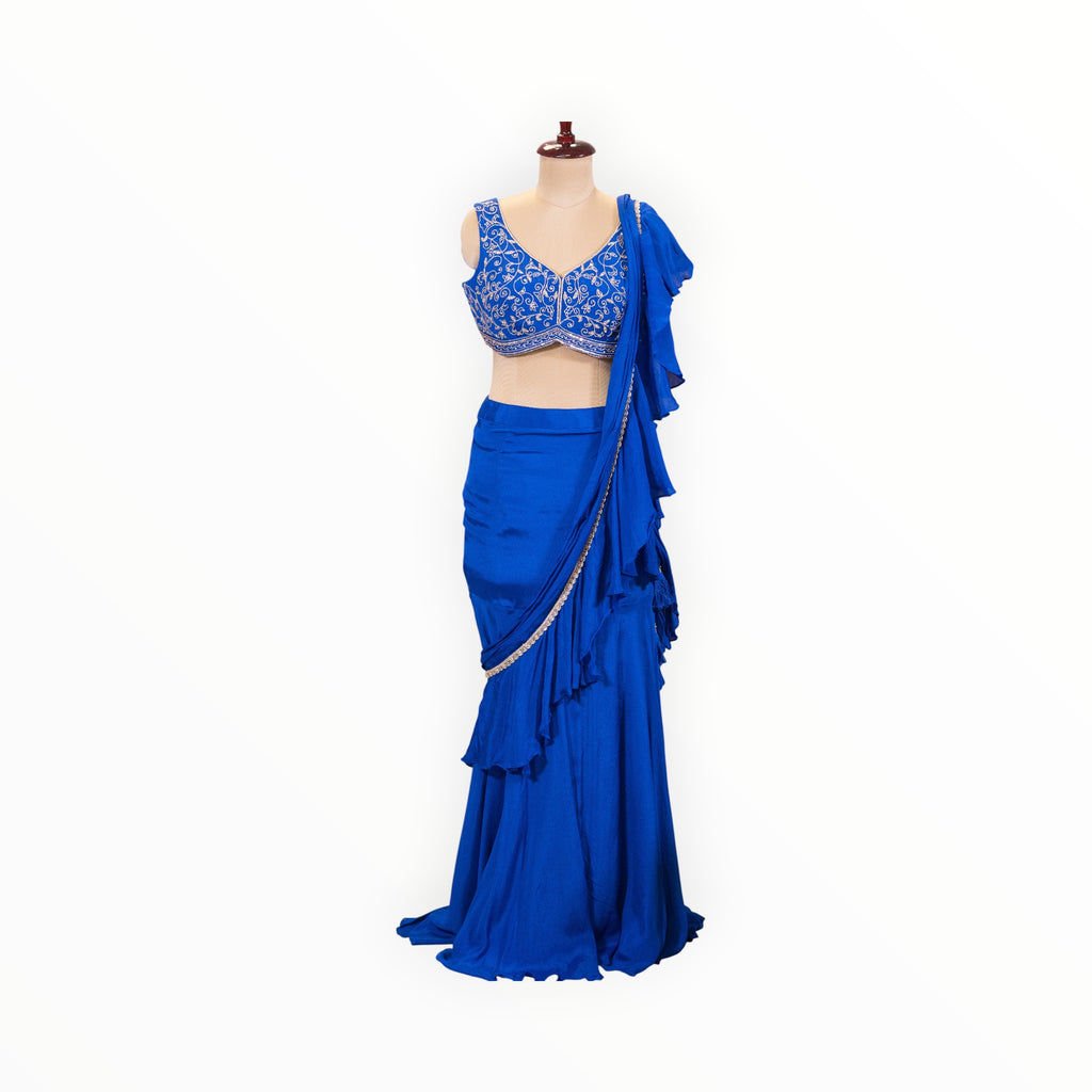 Zari Designs royal blue ready-to-wear saree with a sleeveless embroidered blouse and ruffled skirt detail