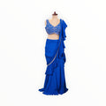 Zari Designs royal blue ready-to-wear saree with a sleeveless embroidered blouse and ruffled skirt detail