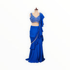 Zari Designs royal blue ready-to-wear saree with a sleeveless embroidered blouse and ruffled skirt detail