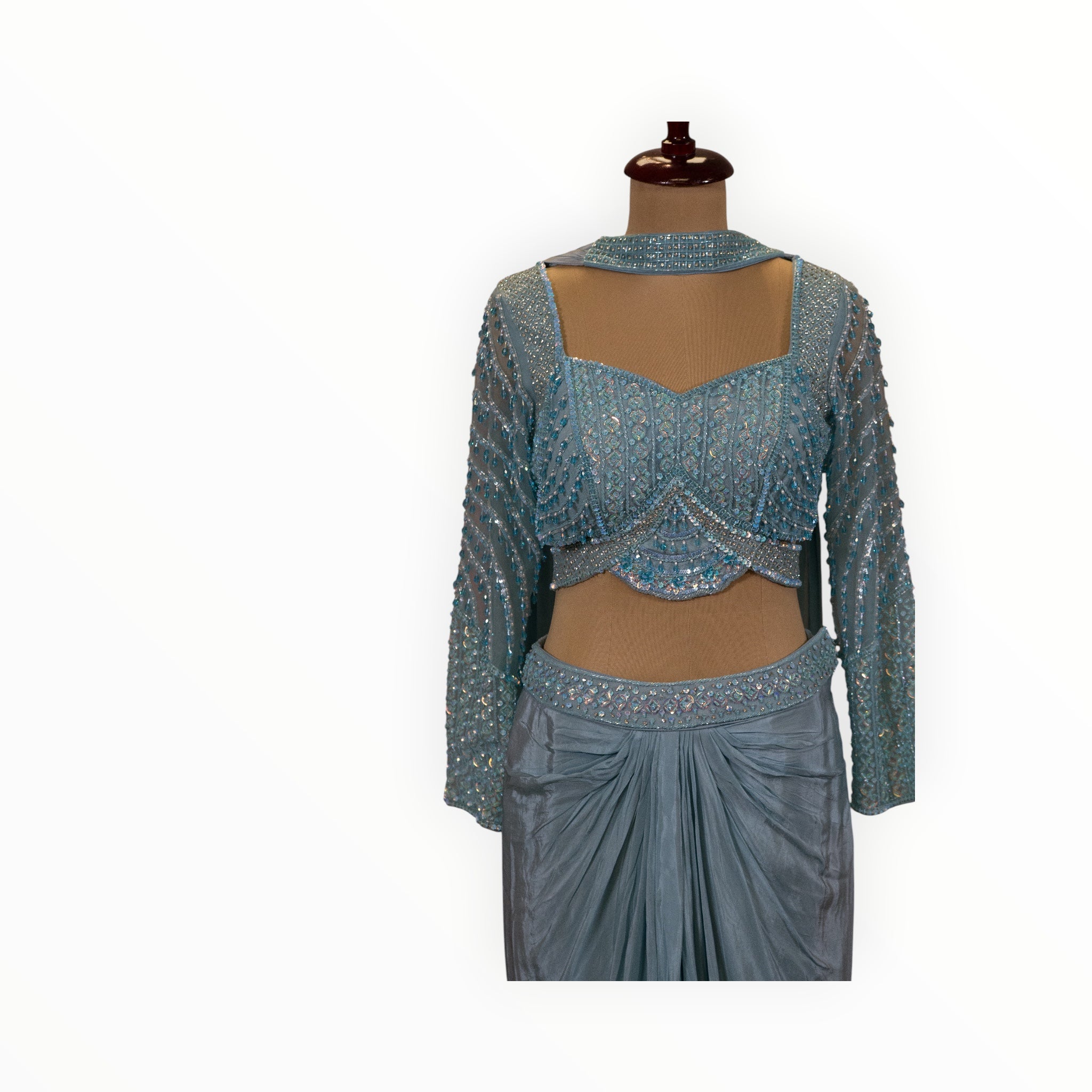 Zari Designs light blue Indo Western lehenga set with intricate silver sequin and bead embroidery on a mannequin