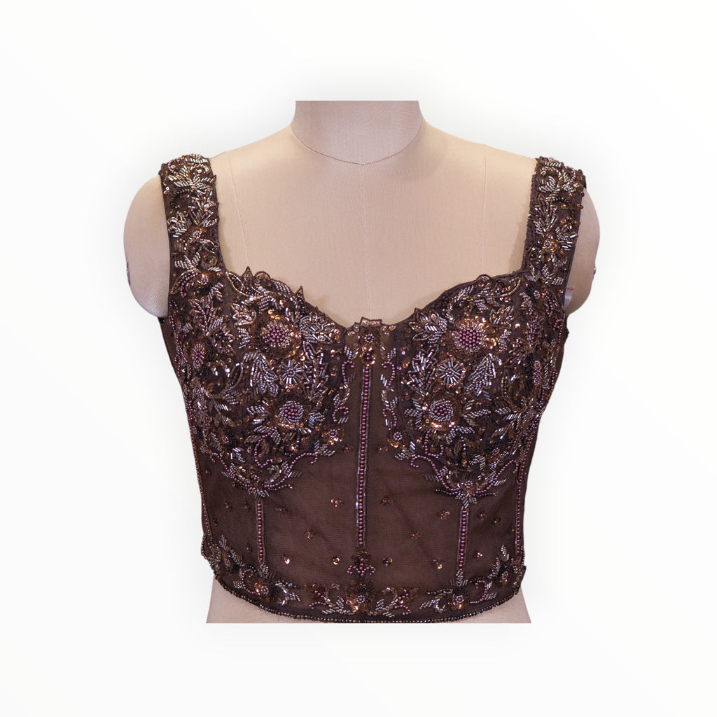 Zari Designs brown corset-style blouse with intricate floral beadwork and sequin embroidery on a mannequin