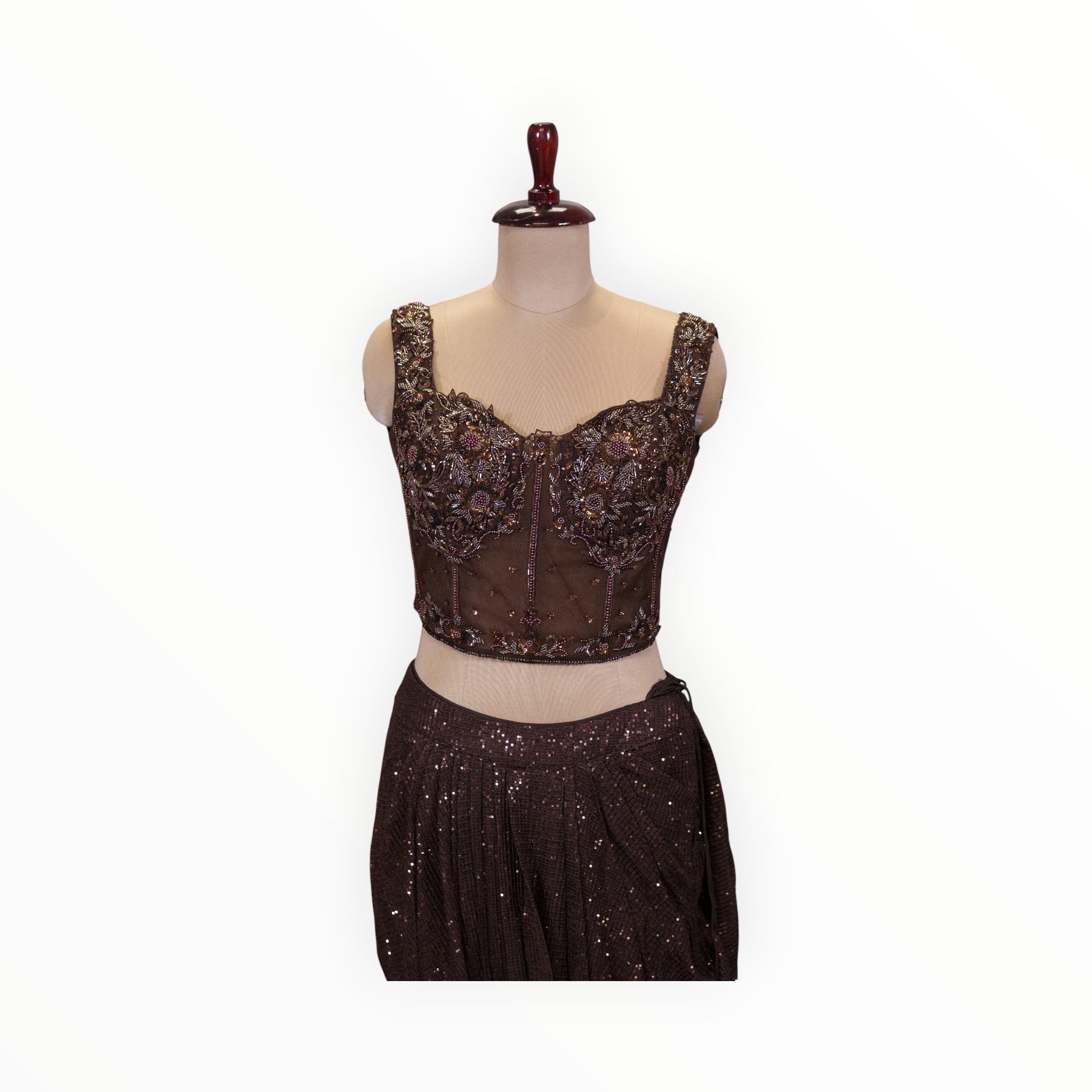 Zari Designs dark brown ready-to-wear saree featuring a corset-style blouse with intricate bead and sequin embroidery.