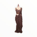 Zari Designs ready-to-wear brown sequined saree with a matching embellished corset-style blouse on a mannequin.