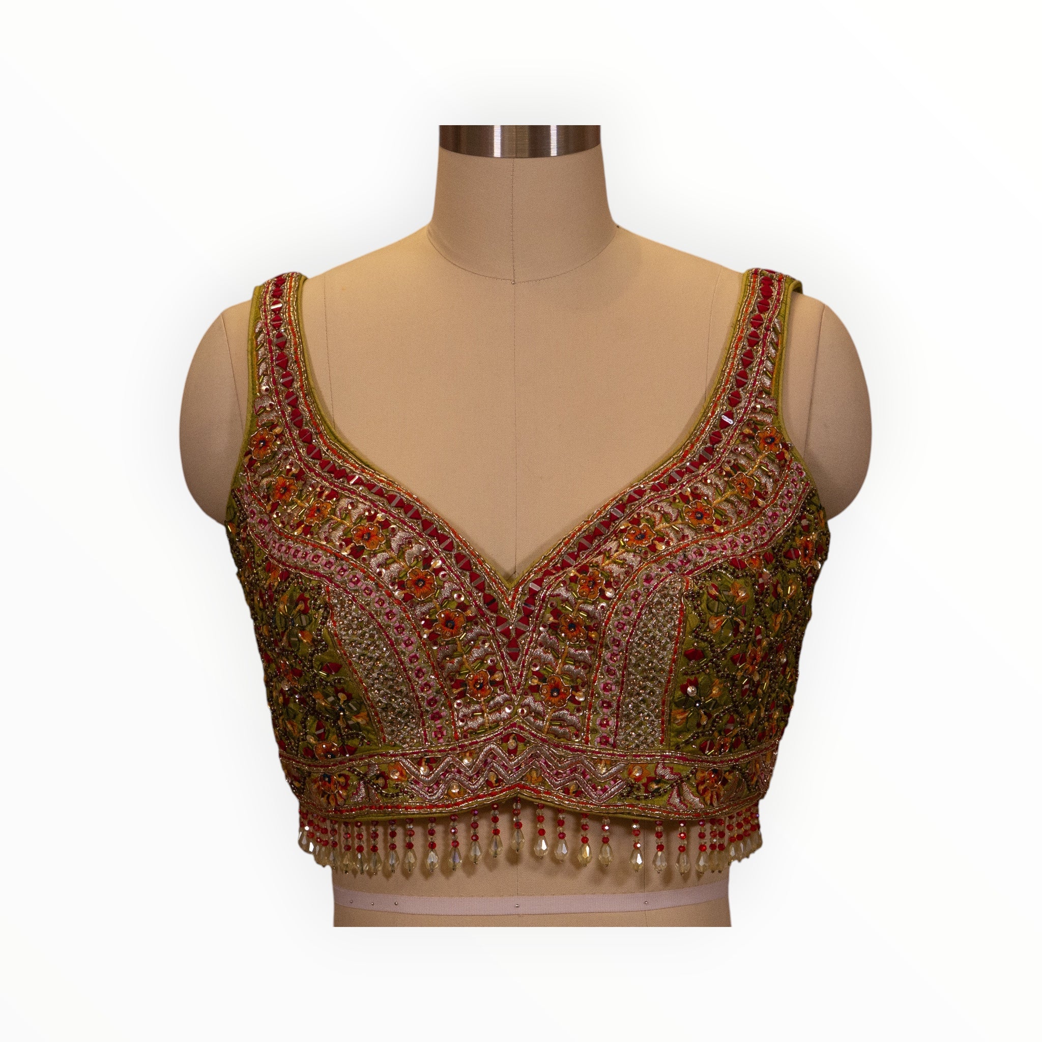 Zari Designs Carnival Lehnga blouse featuring intricate multi-colored floral embroidery, beadwork, and pearl fringe.