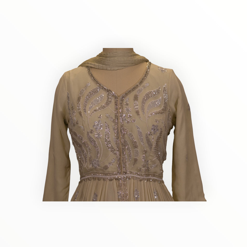 Zari Designs cream Anarkali dress featuring intricate silver sequin and thread embroidery on the bodice
