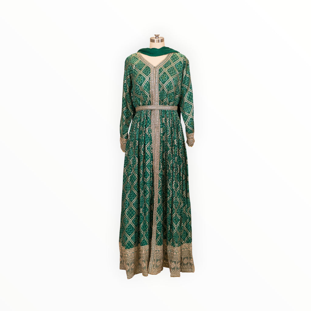 Zari Designs emerald green Anarkali dress with gold bandhani print, intricate embroidery, and matching dupatta