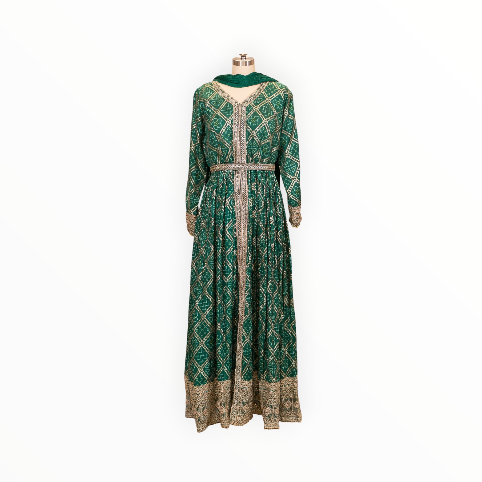 Zari Designs emerald green Anarkali dress with gold bandhani print, intricate embroidery, and matching dupatta