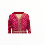 Zari Designs fuchsia pink Anarkali dress with gold bandhani print, sequin embroidery, and a matching red dupatta.
