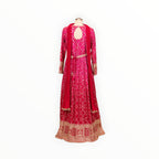 Zari Designs fuchsia pink Anarkali dress with intricate bandhani print, keyhole back, and heavy gold embroidered hem.