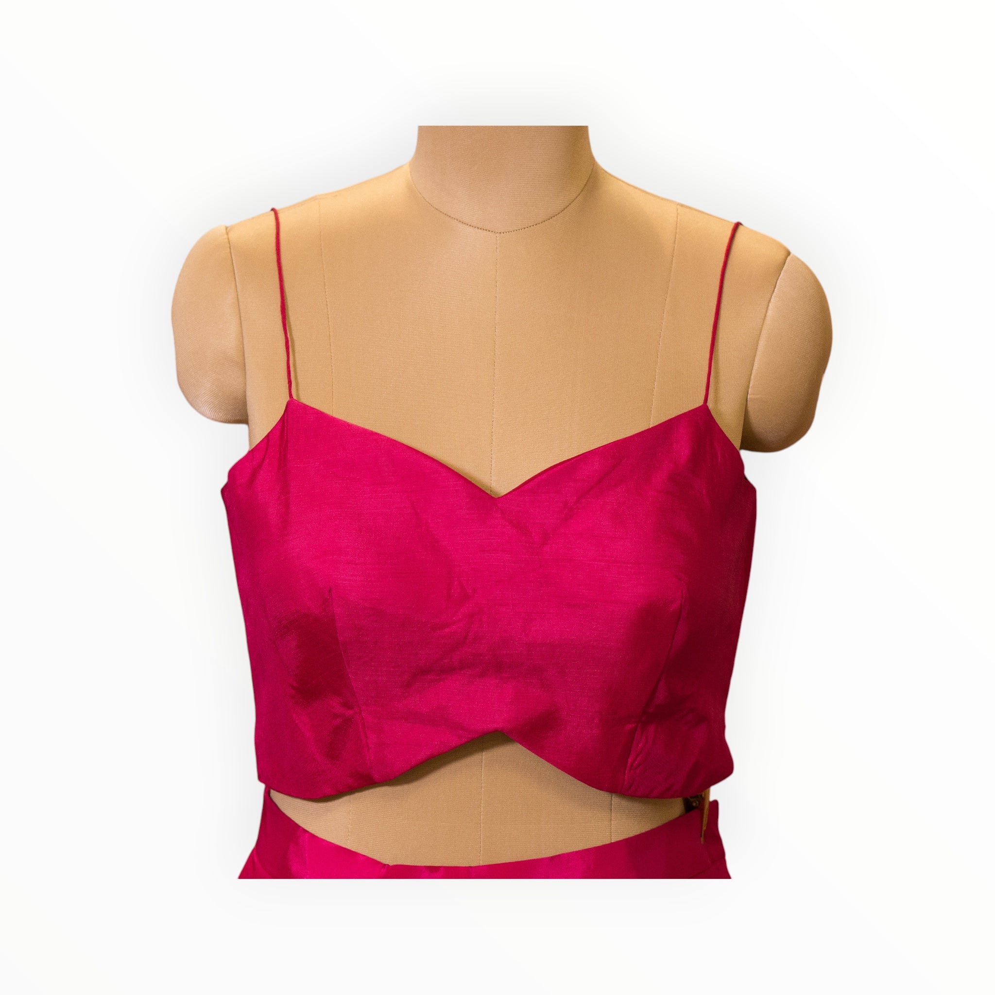 Zari Designs Indo-Western fuchsia pink sleeveless crop top with a sweetheart neckline on a mannequin
