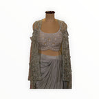 Zari Designs Indo Western crepe outfit featuring a grey draped skirt and a heavily embroidered silver sequin blouse