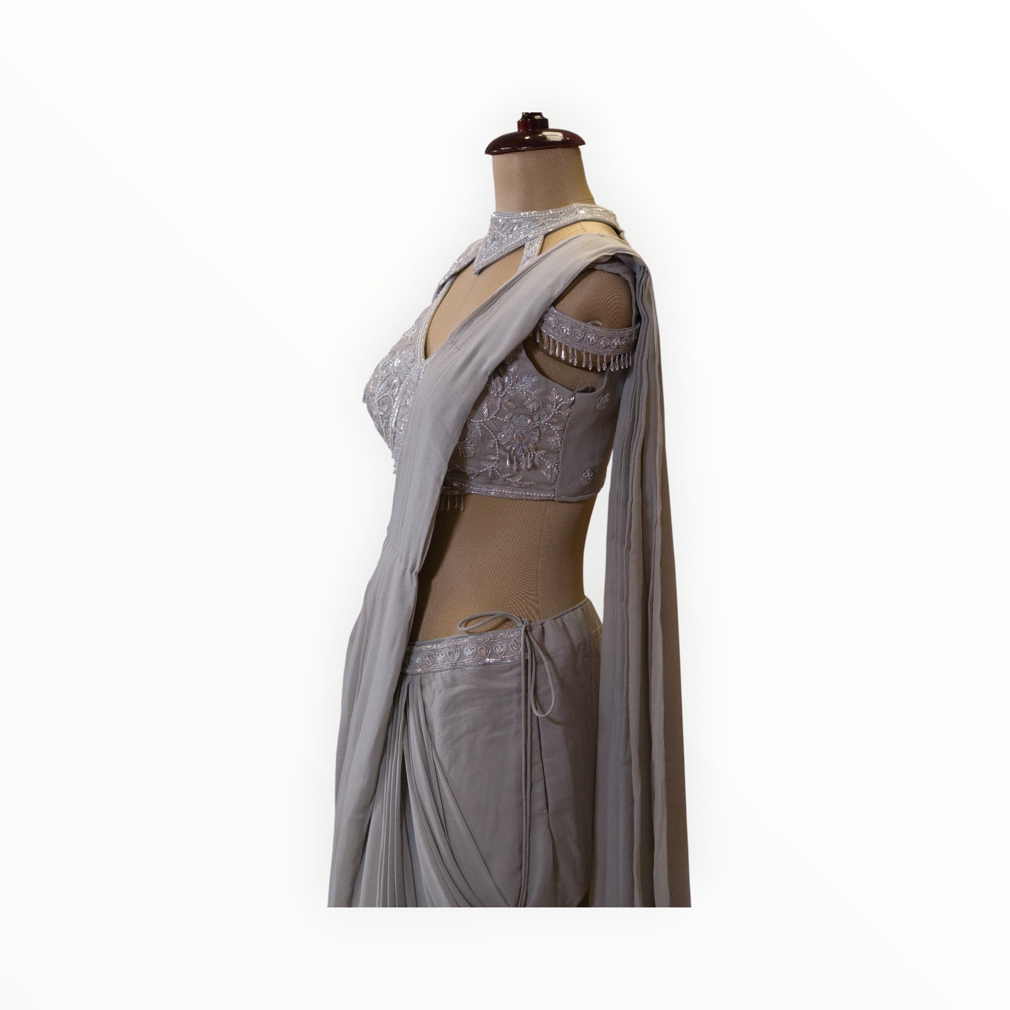 Zari Designs grey georgette ready drape saree with silver embroidered blouse and beaded shoulder detail on mannequin
