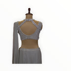 Zari Designs grey georgette ready drape saree featuring a sleeveless blouse with intricate silver sequin embroidery