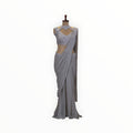 Zari Designs grey georgette ready drape saree with a heavily embellished silver sequin sleeveless blouse