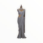 Zari Designs grey georgette ready drape saree with a heavily embellished silver sequin sleeveless blouse