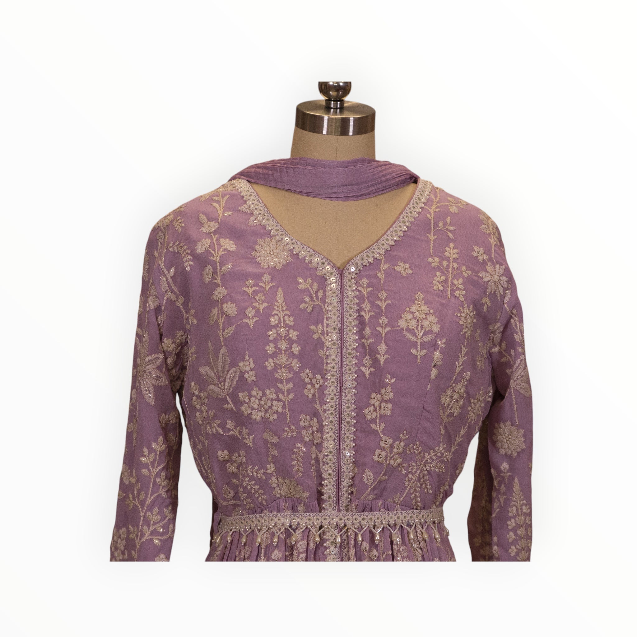 Zari Designs lavender Anarkali dress with intricate white floral embroidery and delicate sequin detailing on a mannequin