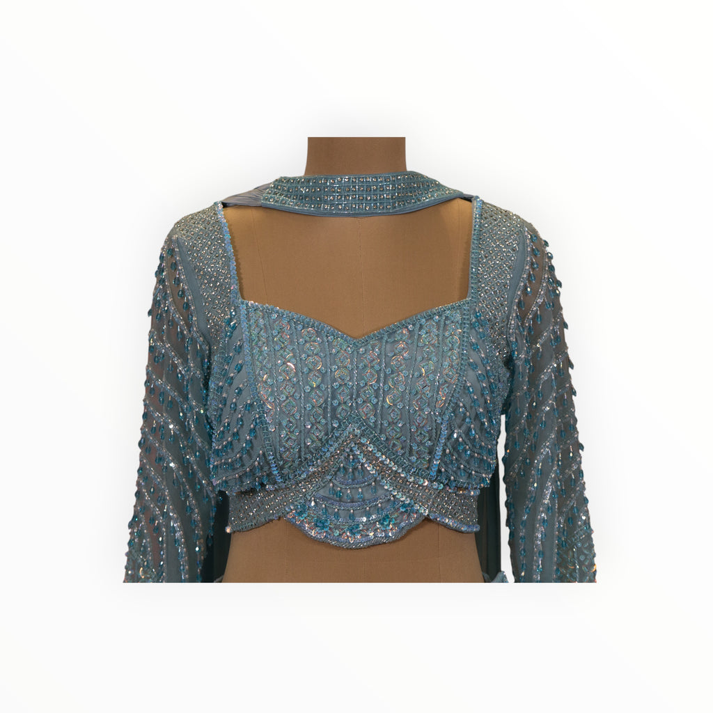 Zari Designs light blue Indo Western blouse with intricate silver sequin embroidery and long sheer sleeves