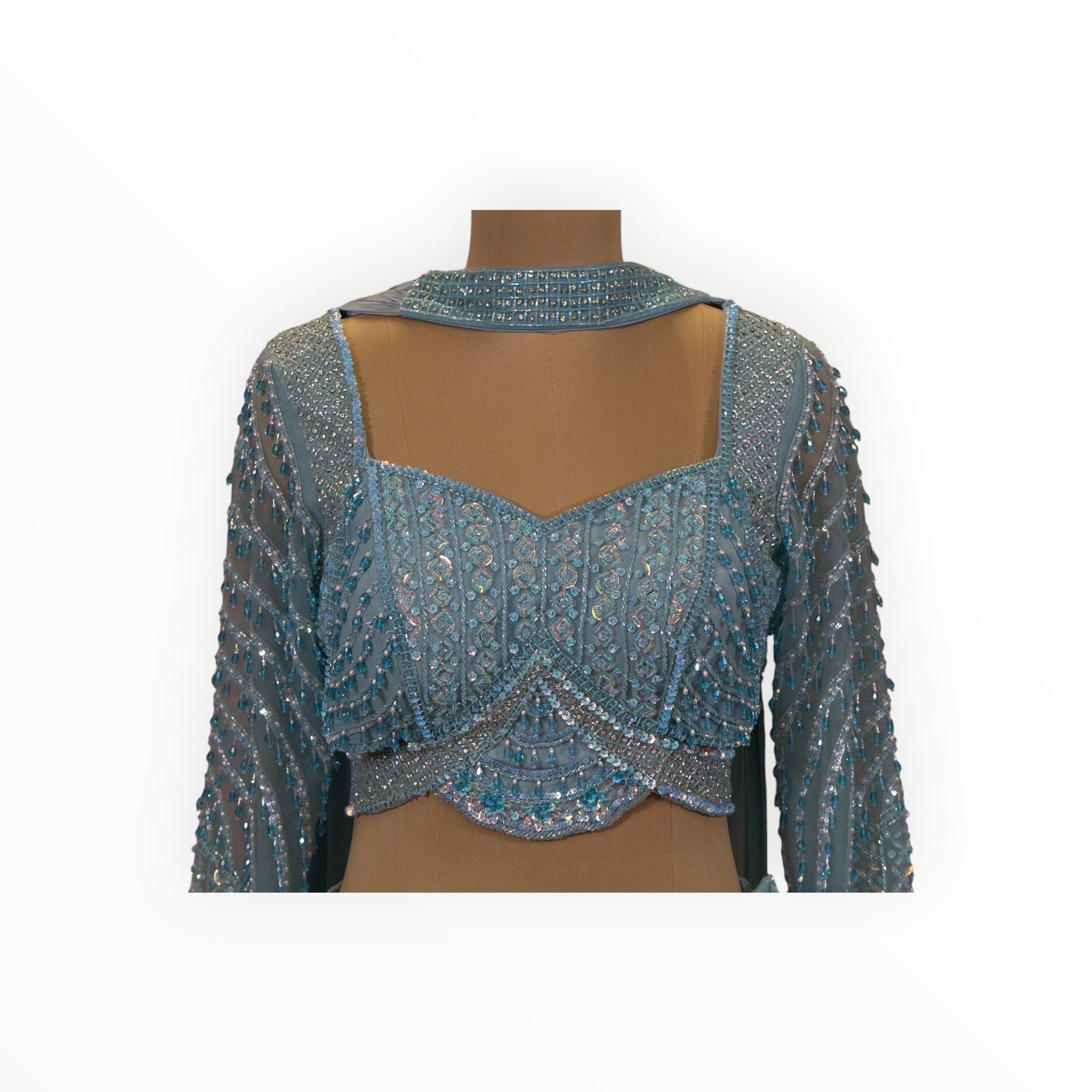 Zari Designs light blue Indo Western blouse with intricate silver sequin embroidery and long sheer sleeves