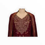 Zari Designs maroon Anarkali dress featuring intricate gold embroidery and a matching dupatta on a mannequin.