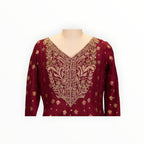 Zari Designs maroon Anarkali dress with intricate gold embroidery on the V-neckline and subtle floral patterns.