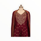 Zari Designs maroon Anarkali dress with intricate gold floral embroidery and matching dupatta on a mannequin
