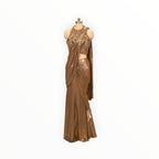 Zari Designs metallic bronze drape saree with a heavily embellished sleeveless blouse featuring intricate beadwork.