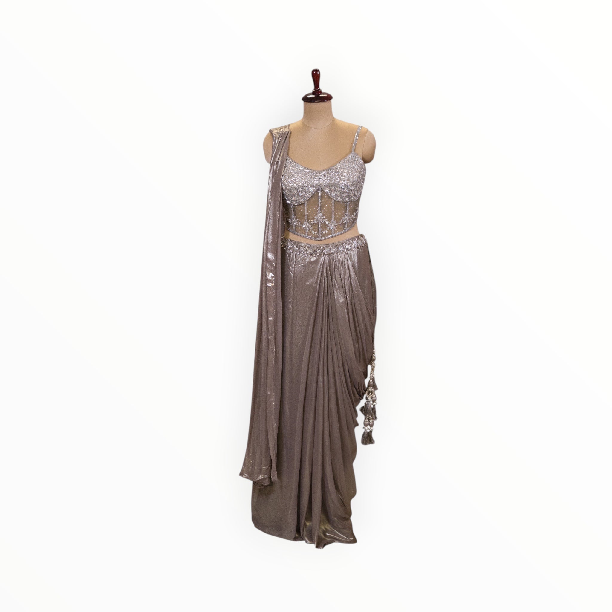 Zari Designs metallic silver ready-to-wear saree with a sequined corset blouse and draped skirt on a mannequin