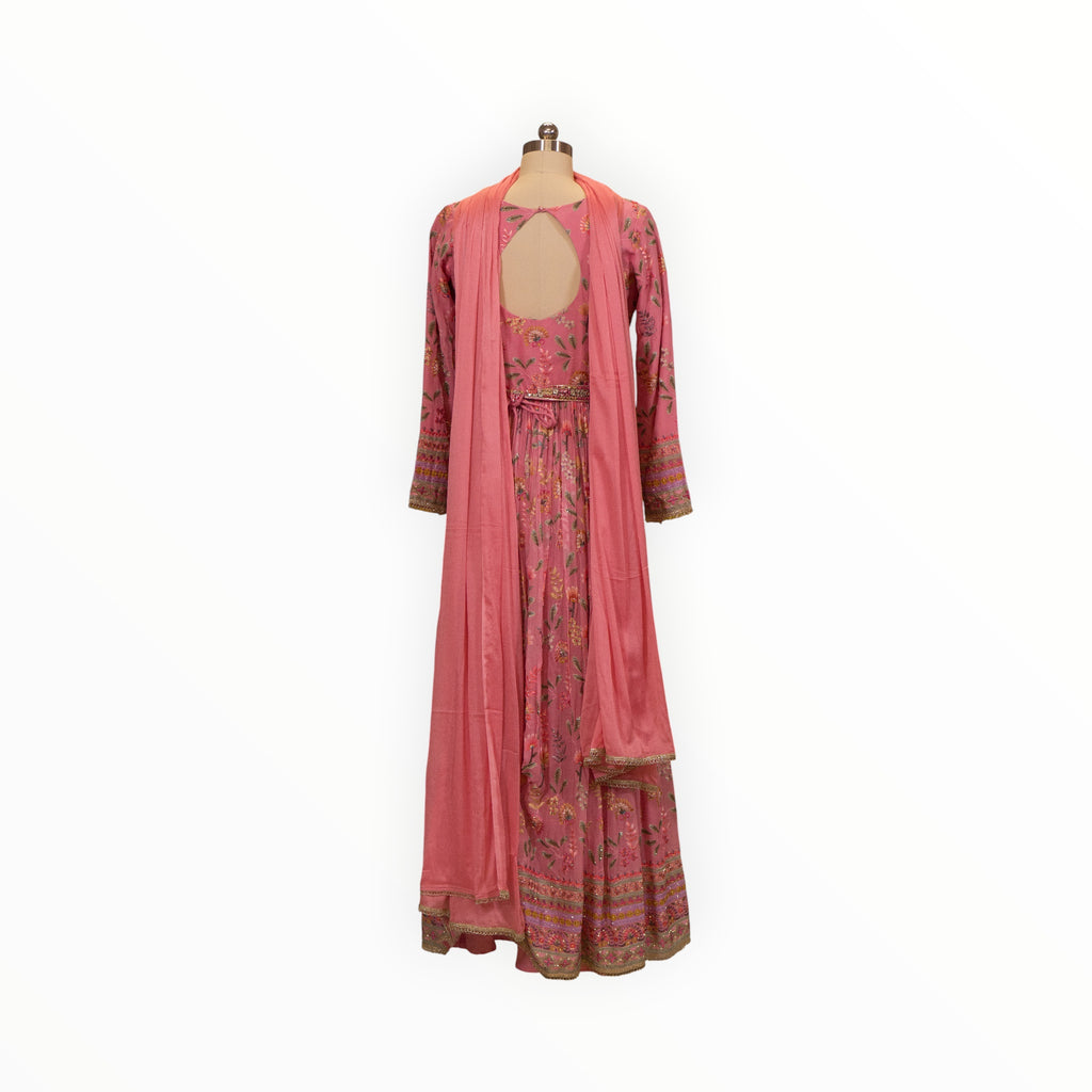 Zari Designs pink Anarkali dress with floral embroidery, back cutout, and matching dupatta on a mannequin
