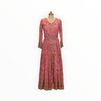 Zari Designs pink Anarkali dress with floral embroidery, long sleeves, and intricate beaded border detailing.