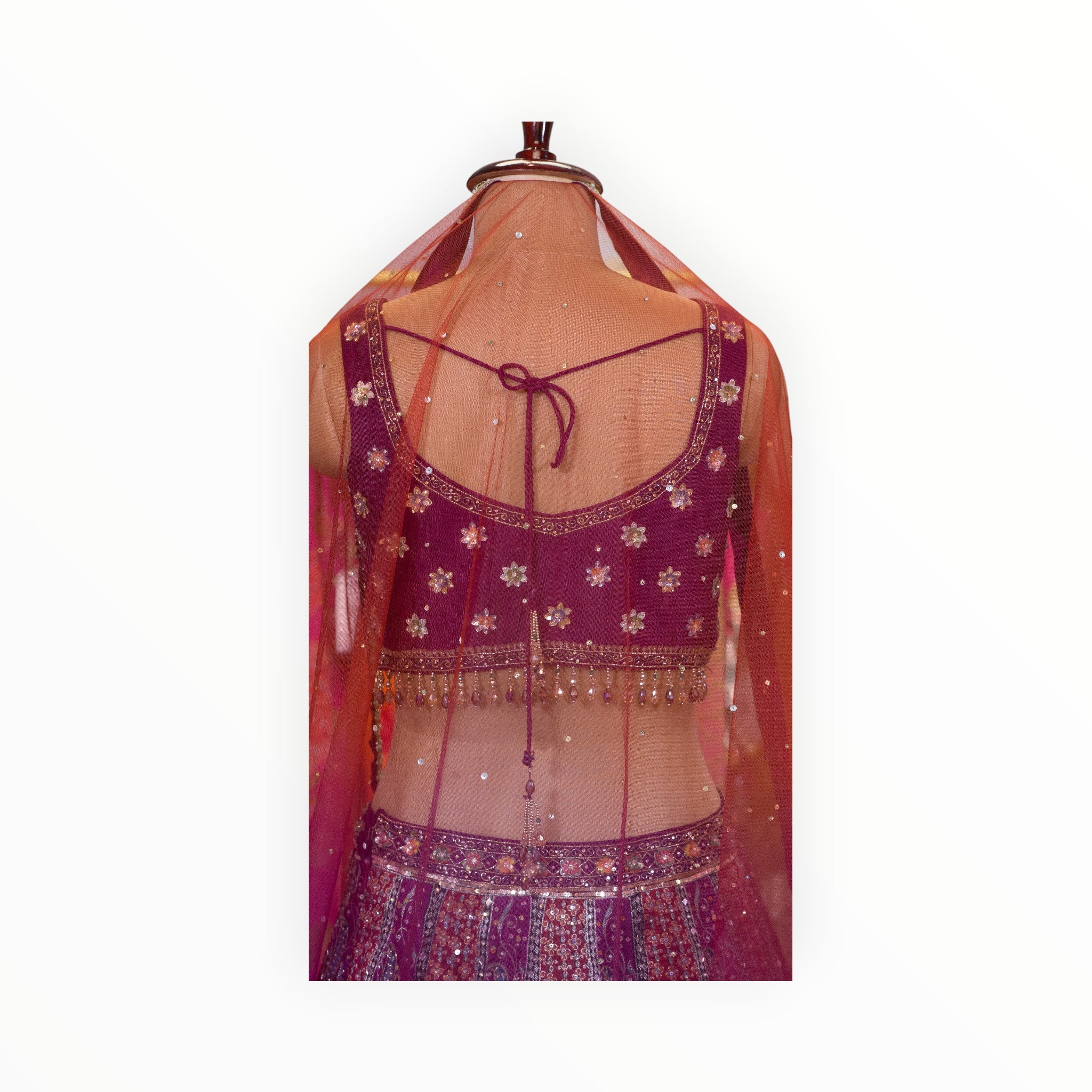 Zari Designs purple Banarsi lehnga blouse with intricate floral embroidery, sequins, and a sheer red dupatta back view