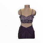 Zari Designs ready saree featuring a deep purple blouse with intricate beadwork and a matching draped skirt.