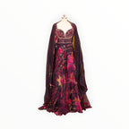 Zari Designs Anarkali VRST3008 featuring a deep purple floral print gown with a matching sheer cape overlay