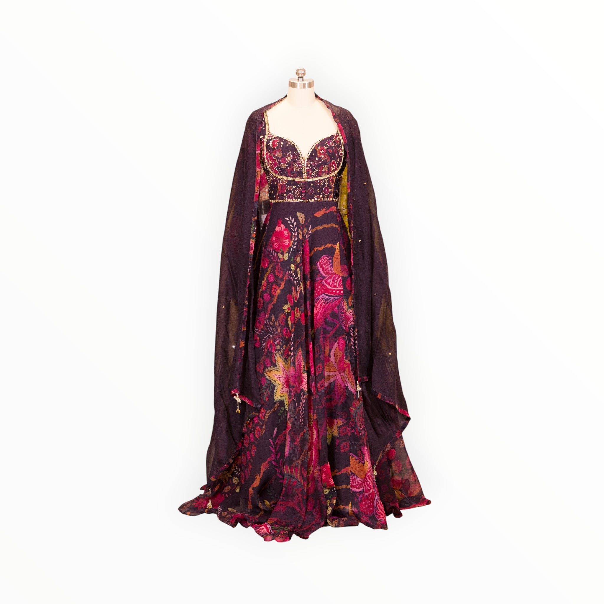 Zari Designs Anarkali VRST3008 featuring a deep purple floral print gown with a matching sheer cape overlay