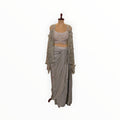 Zari Designs Indo Western crepe outfit featuring a silver embellished crop top, matching shrug, and draped skirt.