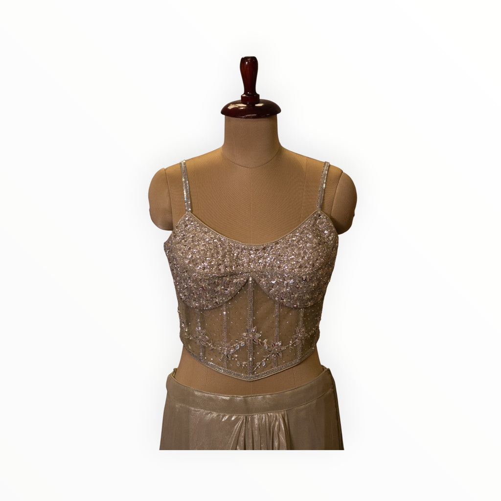 Zari Designs silver embellished corset blouse with intricate beadwork and spaghetti straps on a mannequin