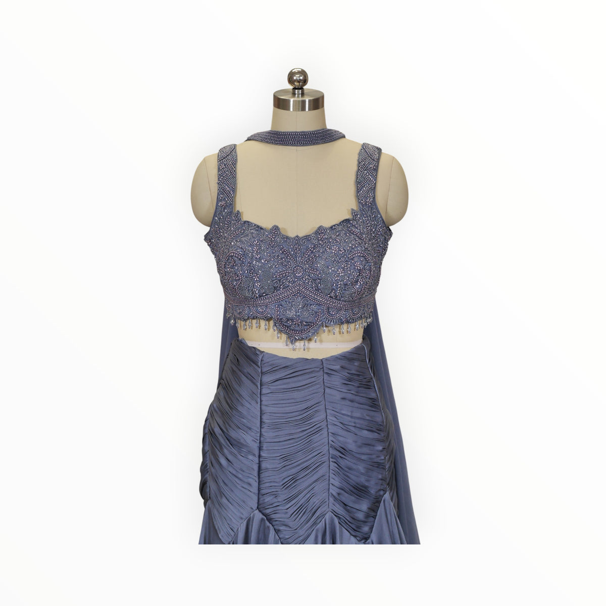 Zari Designs traditional Indian lehnga in slate blue with intricate beadwork and embroidery on the sleeveless bodice
